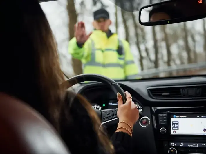 Rideshare injury lawyer reviewing insurance records after collision near Tempe Town Lake