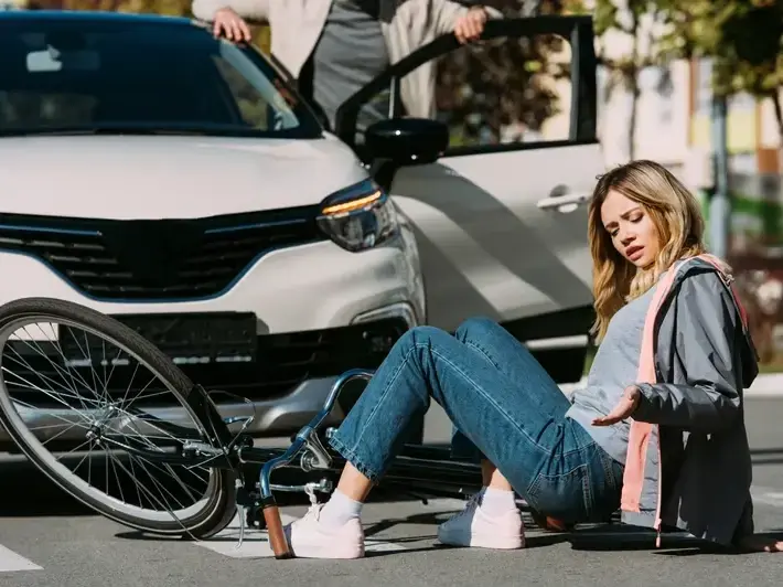 Queen Creek rideshare accident attorney reviewing Uber injury claim documents after crash near Queen Creek Olive Mill